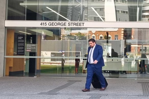 Solicitor Rowan King leaves the Supreme Court in Brisbane.