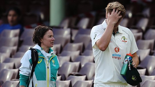 Green leaves the field after the nasty blow.