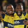 Central Coast Mainers players celebrate making the grand final.