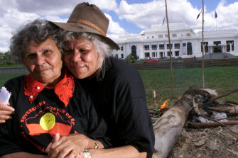 Wadjularbinna Nulyarimma (L) and Isobel Coe at the Aboriginal Tent Embassy in front of Old Parliament House in 1999.