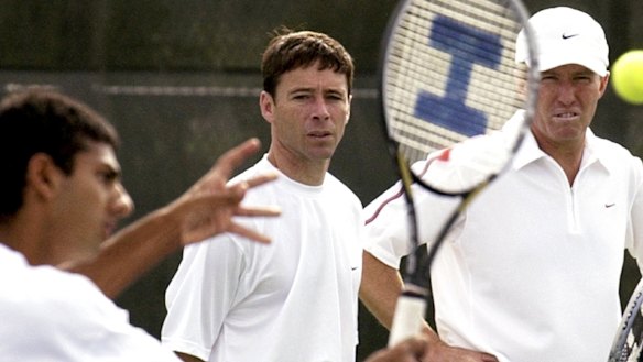 University of Illinois men’s tennis coach Craig Tiley (right) and associate head coach Bruce Berque watch Pramod Dabir practise in 2004.