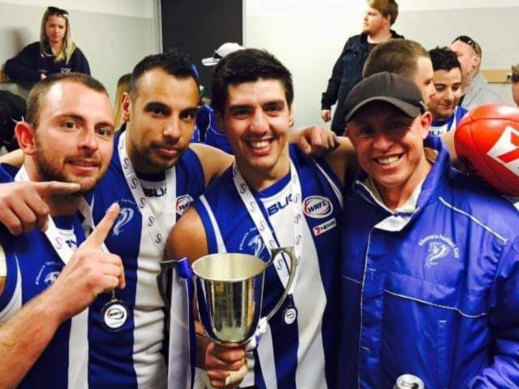 Lifelong friends: Dean (second from left) and Michael Spatolisano (far left) with the Albanvale Cobras 2015 senior premiership cup.
