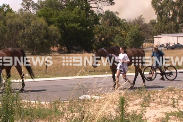 Residents evacuate. 
