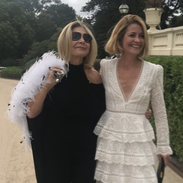 Carla Zampatti and Kellie Hush arriving at  Government House in Victoria for the opening of the 2018 Melbourne Fashion Festival. 