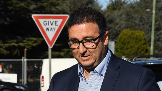 Shaoquett Moselmane leaves his Rockdale home on the day of the raids.