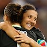 Sam Kerr and Caitlin Foord celebrate the win.