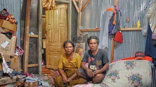 Lombok refugees Ismail, right, and his wife  Suhaini  in their temporary home.