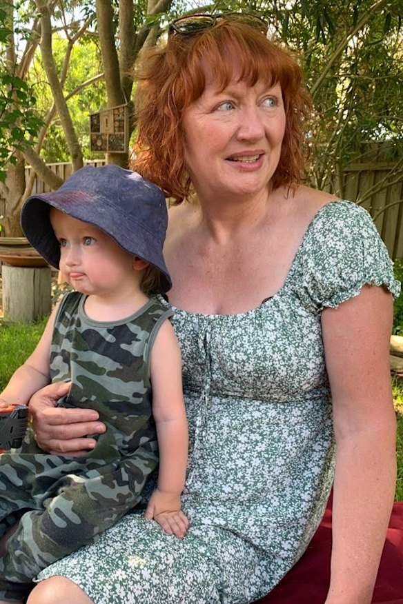 Sue Given, an ex-Mormon, with her grandson. Given quit the Church over its homophobia.
