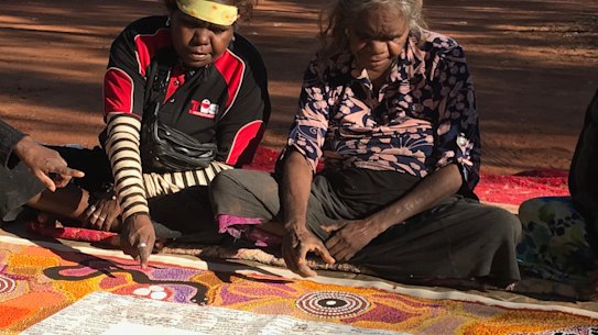 Artists work on the Uluru statement