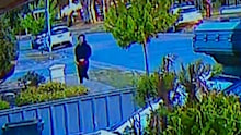 The 18-year-old was allegedly spotted on security cameras watching the girls at the playground.