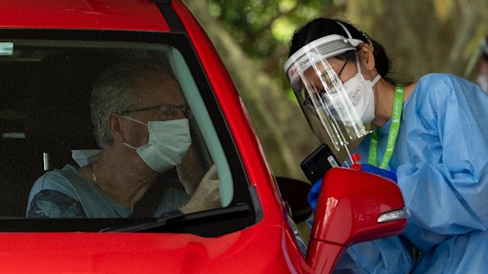 Rozelle drive-through COVID-19 testing clinic. January 8, 2022. Photo: Rhett Wyman/SMH Number plate blurred. 