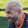 Api Koroisau inked a new deal and rocked some fresh blond locks.
