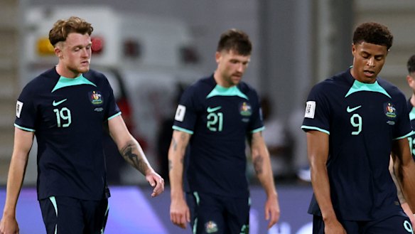 Harry Souttar, Cameron Burgess and Kusini Yengi sport long faces after full-time.