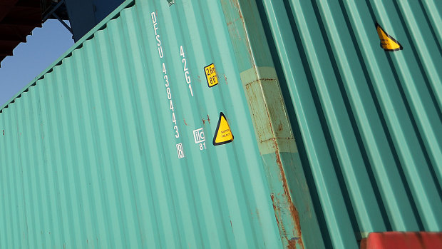 The girl alleges she was made to sleep in a shipping container for more than four months. 