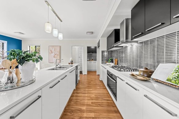 The tidy five-bedroom, three-bathroom house at 5 Torville Road.