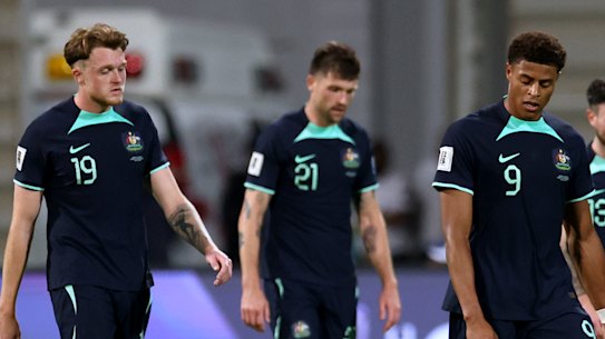 Harry Souttar, Cameron Burgess and Kusini Yengi sport long faces after full-time.