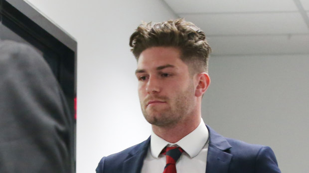 Tomas Bugg leaves the tribunals after being banned for his hit on Callum Mills.