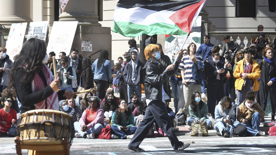 Several hundred students and pro-Palestinian supporters rally at the intersection of Grove and College Streets, in front of Woolsey Hall on the campus of Yale University in New Haven, Connecticut.