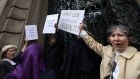 Women protest for equality at the entrance to the Garrick Club in London in March. 