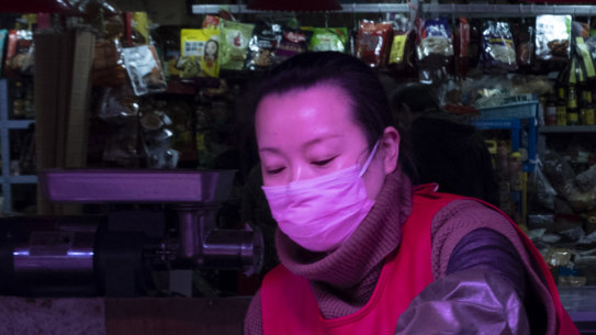 Li Huiying, 36, a butcher at a suburban market in eastern Beijing