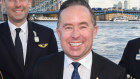 Qantas Group chief executive Alan Joyce, centre, with flight deck crew in London. Captain Helen Trenerry, second from right, will command the historic London-Sydney flight. 