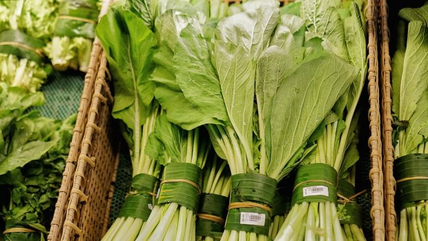 Fresh produce wrapped in banana leaves tied with bamboo string - not plastic - in Bali's Bintang supermarket.