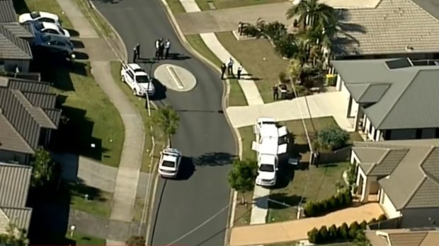 Police closed part of Topaz Drive at Mango Hill following the death of a woman in her 70s.