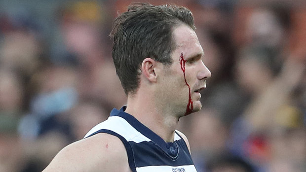 A bloodied Patrick Dangerfield comes off during the clash with Adelaide.