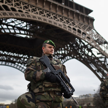Armed troops, such as these around the Eiffel Tower, have become a familiar sight in Europe following a string of deadly terrorist attacks.