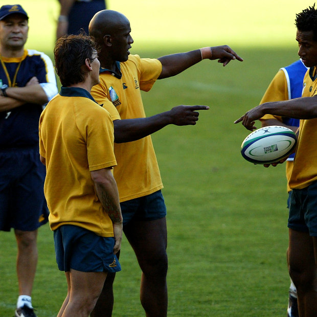 Eddie Jones and league defectors Mat Rogers, Wendell Sailor and Lote Tuqiri in 2003.