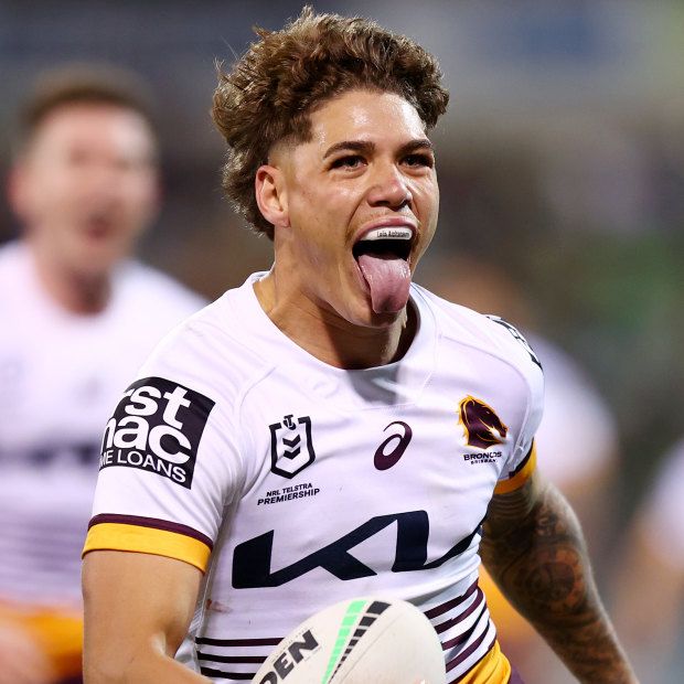 NRL BRONCOS COWBOYS, Reece Walsh of the Broncos kiss his jersey after  scoring a try during the NRL