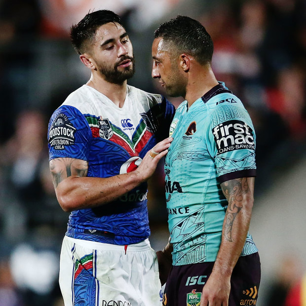 Shaun Johnson with his idol, Benji Marshall, while playing for the Warriors against the Broncos in 2017.