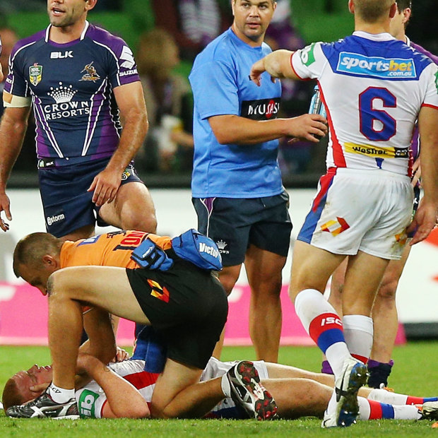 Alex McKinnon on the ground after the tragic tackle in 2014 in Melbourne.