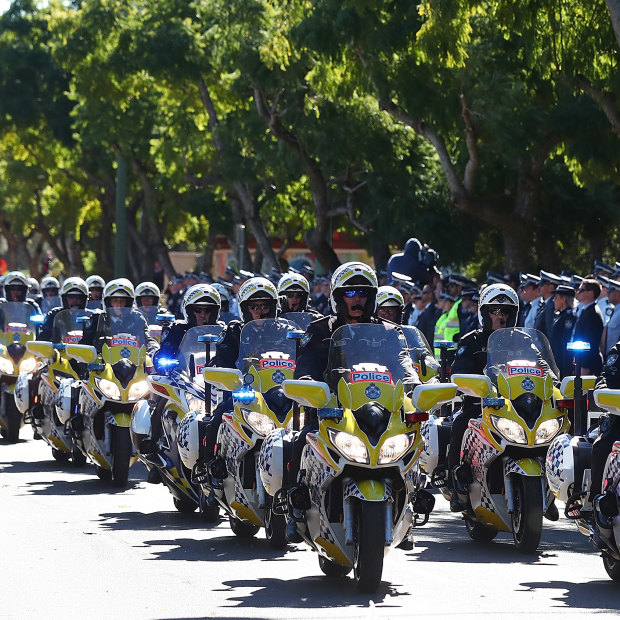 The police convoy - which featured motorbike, horses and dogs - during the final goodbye to Senior Constable Brett Forte in Toowoomba on June 7, 2017.