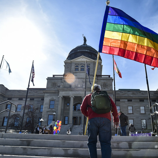 Demonstrators gather on the step of the Montana State Capitol in 2021 after the Senate Judiciary Committee voted to advance two bills targeting transgender youth despite overwhelming testimony opposing the measures.