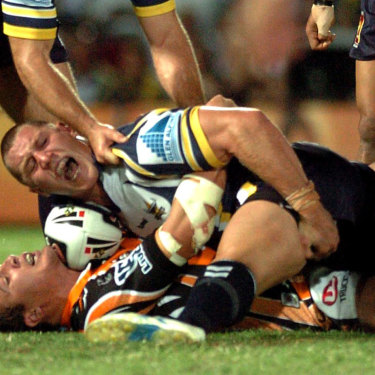 Agony: Luke O'Donnell writhes in pain after the tackle in 2007 that sidelined him for months.