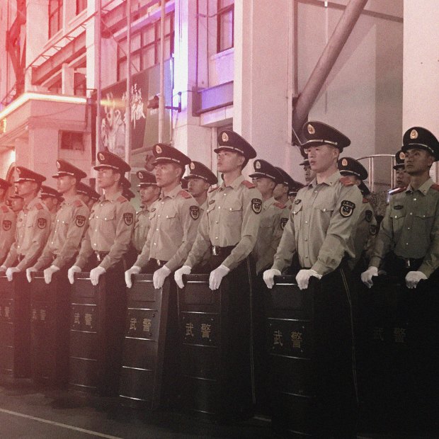 Paramilitary police outside Beijing’s Workers’ Stadium. 