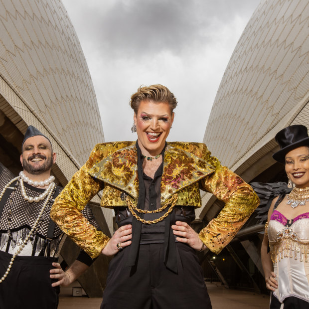 2023 WorldPride host Reuben Kaye, centre, with Opera Australia principle singers Benjamin Rasheed and Cathy-Di Zhang at the Sydney Opera House.