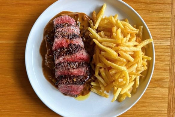 Steak frites with mushroom sauce at Bart Junior in Redfern.