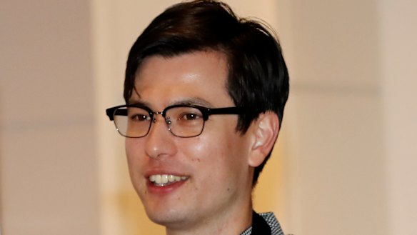 Australian student Alek Sigley arrives at the airport in Tokyo on Thursday.