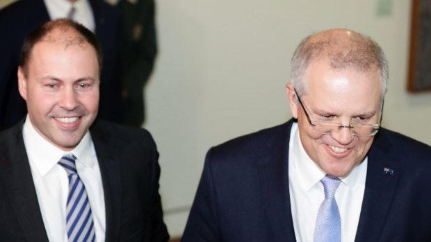 Josh Frydenberg and Scott Morrison exit after the party-room meeting for the leadership on August 24.