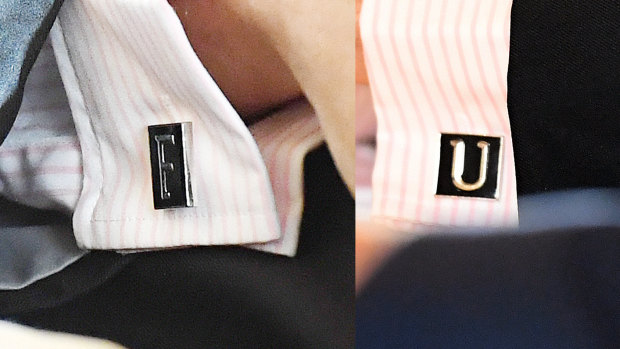A composite image combining photographs of the two cufflinks worn by State MP for Kawana, Jarrod Bleijie.