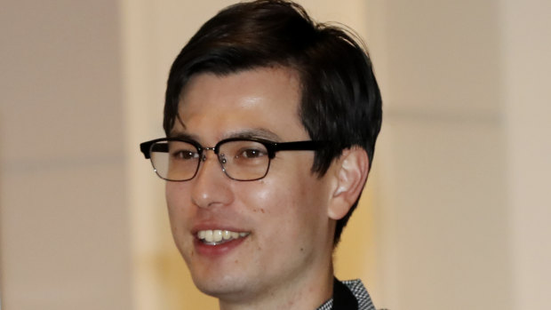 Australian student Alek Sigley arrives at the airport in Tokyo on Thursday.