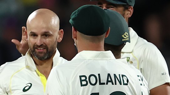 Nathan Lyon celebrates the wicket of Jermaine Blackwood.