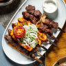 Skewer medley with batata bi kizbara and cheese sambousek from Al Aseel in Liverpool.