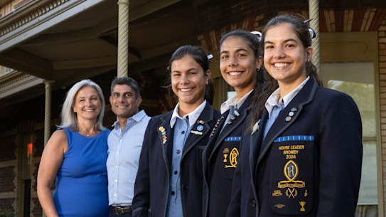 Amy Reed, her husband Owen Hereford and their daughters Bella, year 8; Elizabeth, year 10; and Grace. year 12 at  Ruyton Girls’ school in Kew.