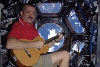 Astronaut Chris Hadfield has talked about his improved understanding of threats facing the planet since seeing Earth from space.