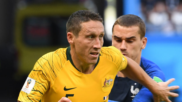 Staying on: Mark Milligan will remain with Australia through to the 2019 Asian Cup at least.