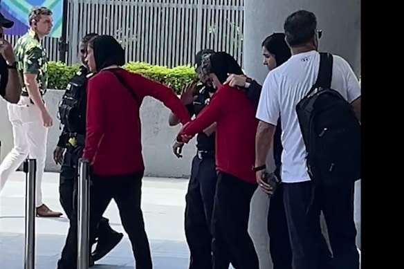 Iranian players leaving their hotel on the Gold Coast.