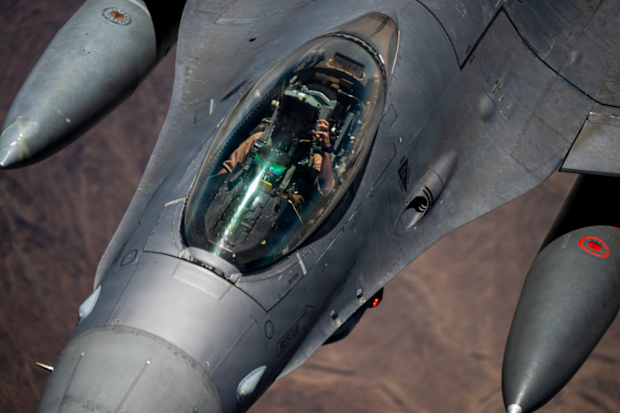 A US Air Force F-16 Fighting Falcon flies over the Middle East during a patrol.